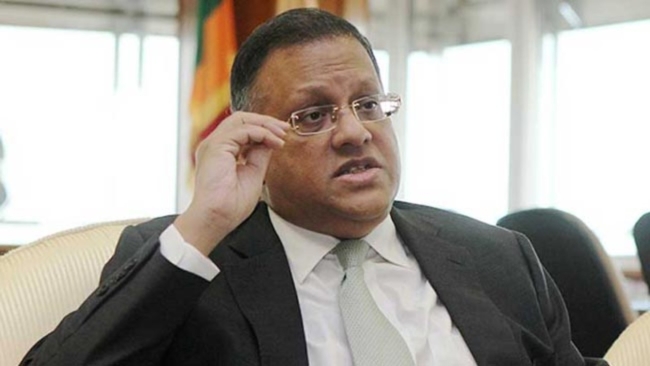 அர்ஜுன மகேந்திரன் நாட்டுக்கு?